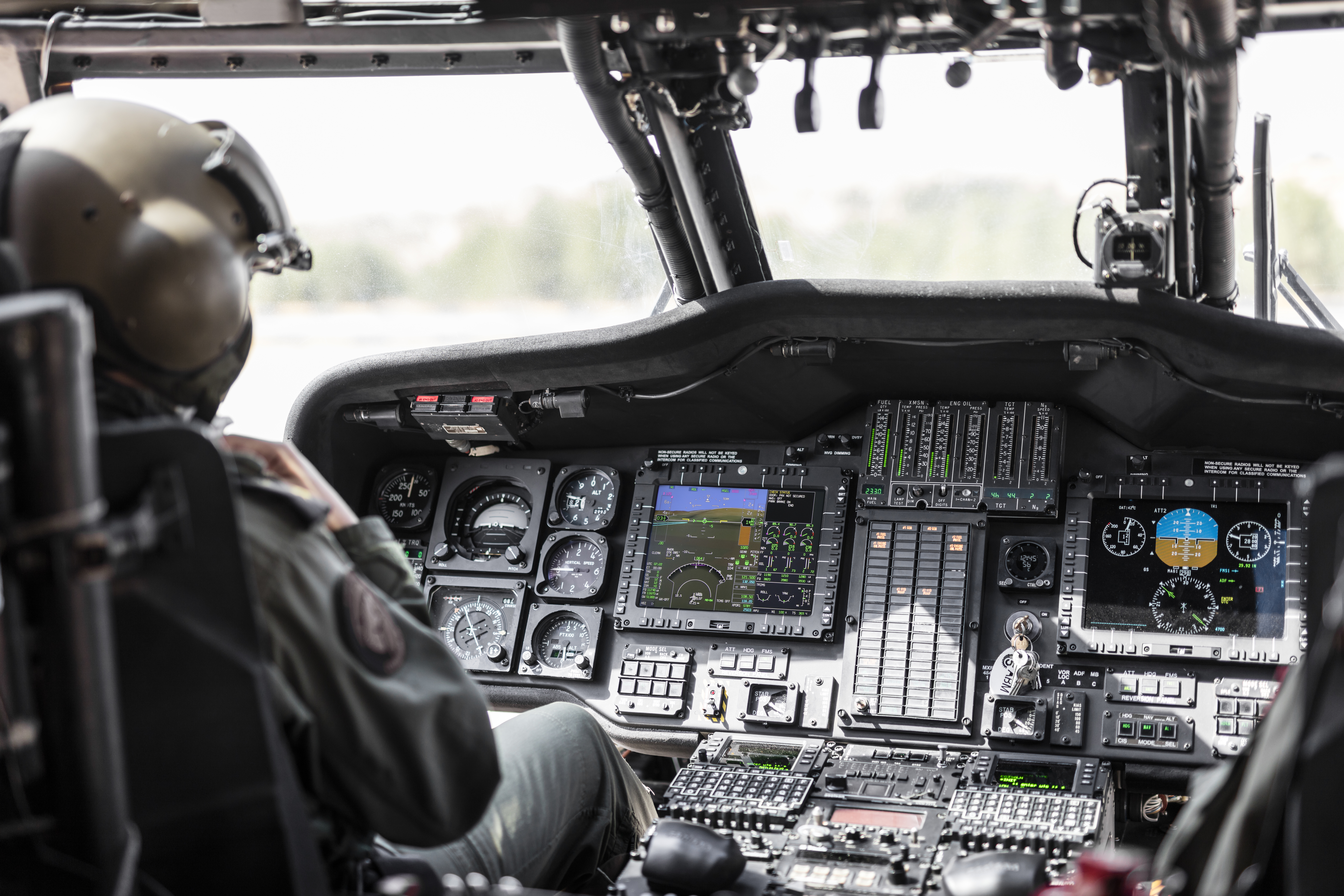 Army Pilot Riding Military Helicopter